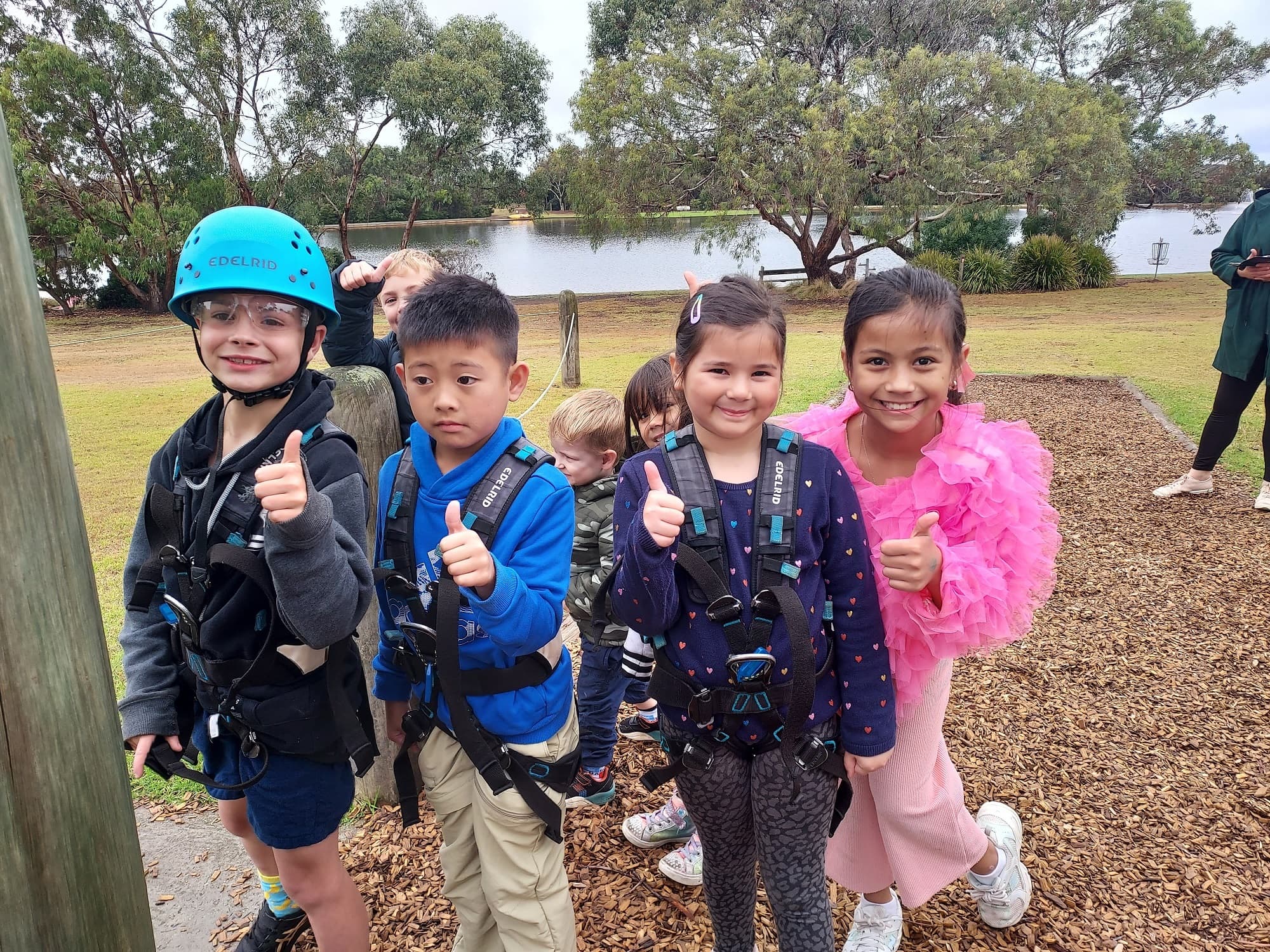 Four children enjoying an outdoor activity.