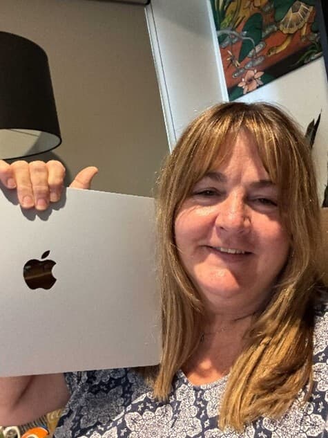 MS Go For Gold Scholarship recipient, Karyn, with her new Apple Mac laptop.