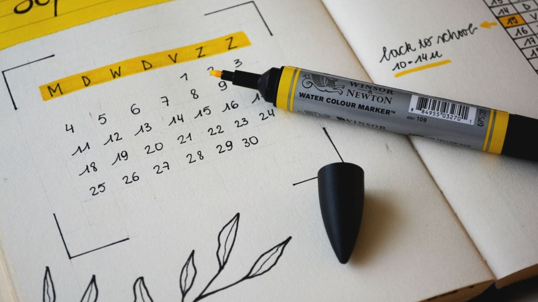 Handwritten calendar with yellow highlights