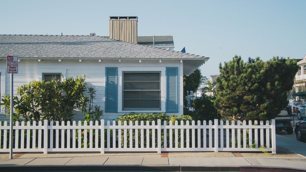 House with white picket fence